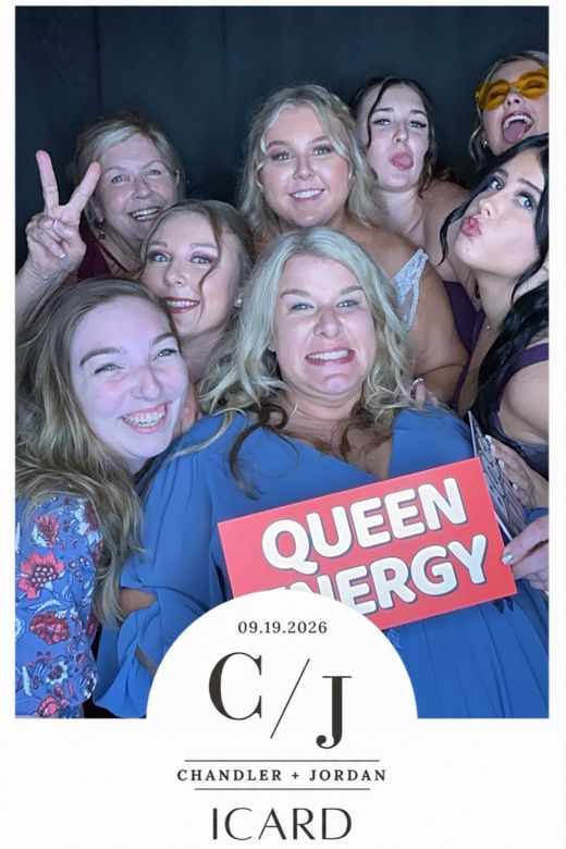 Chandler & Jordan wedding print: a group of friends with a 'Queen Energy' sign